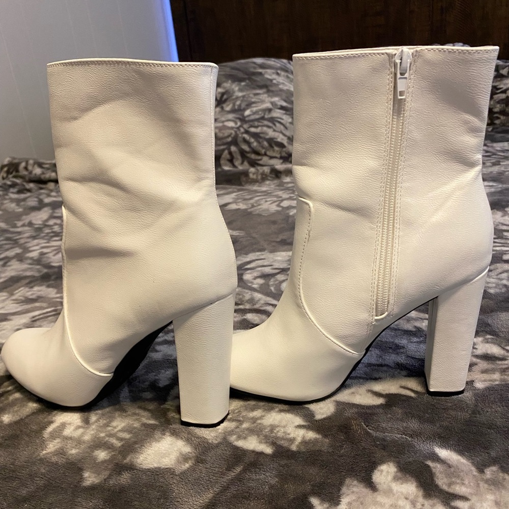 Leather high heel ankle boots size 7.5